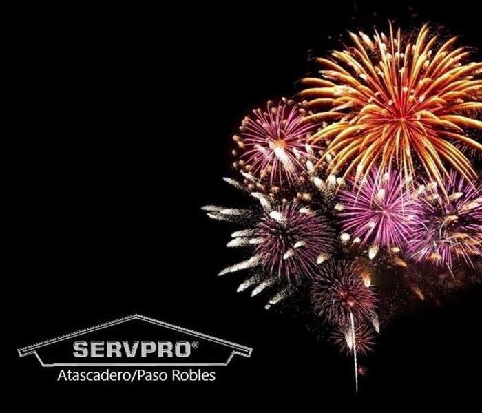 SERVPRO logo with red yellow fireworks in the background